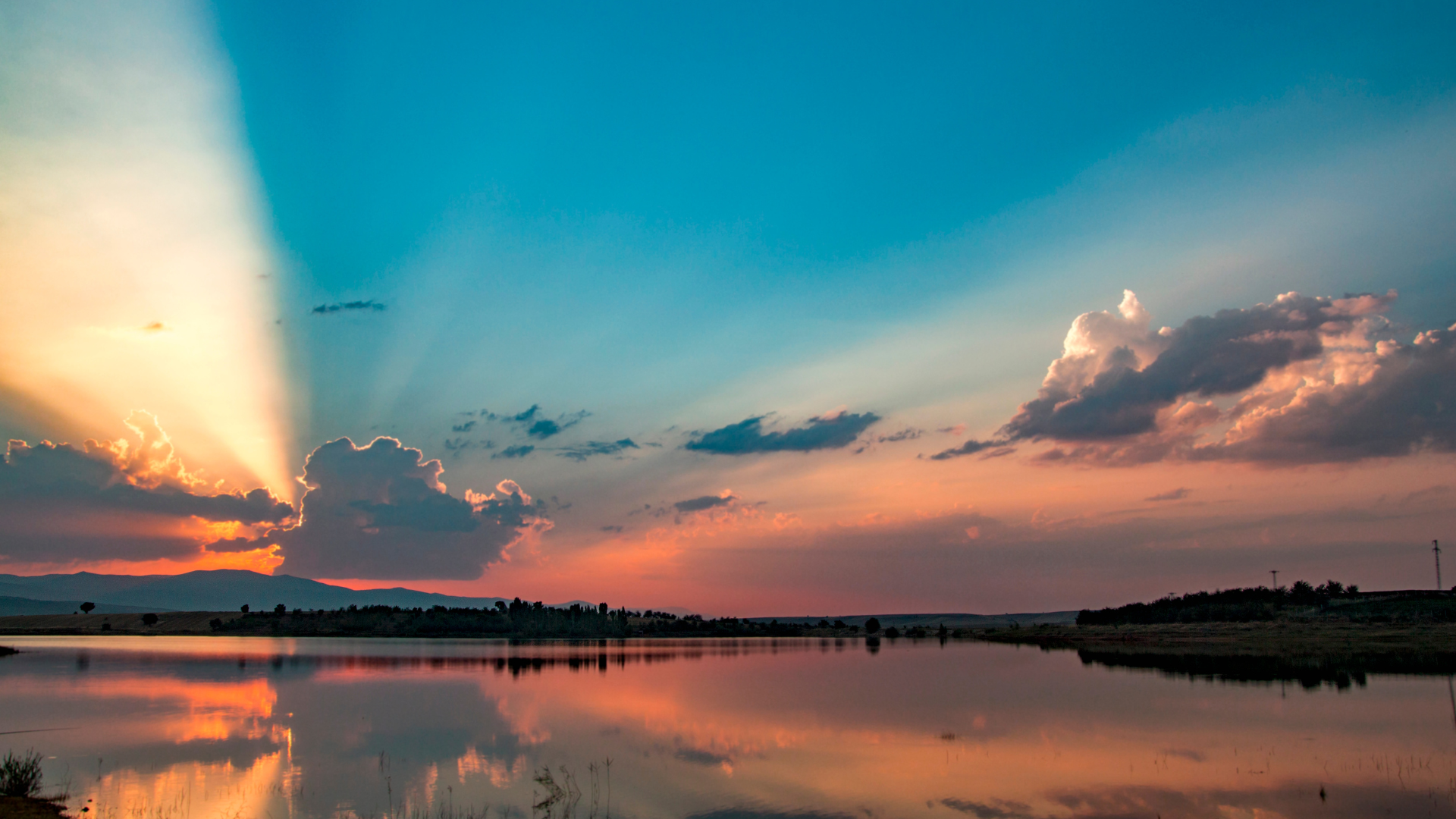 Sun set with reflective lake