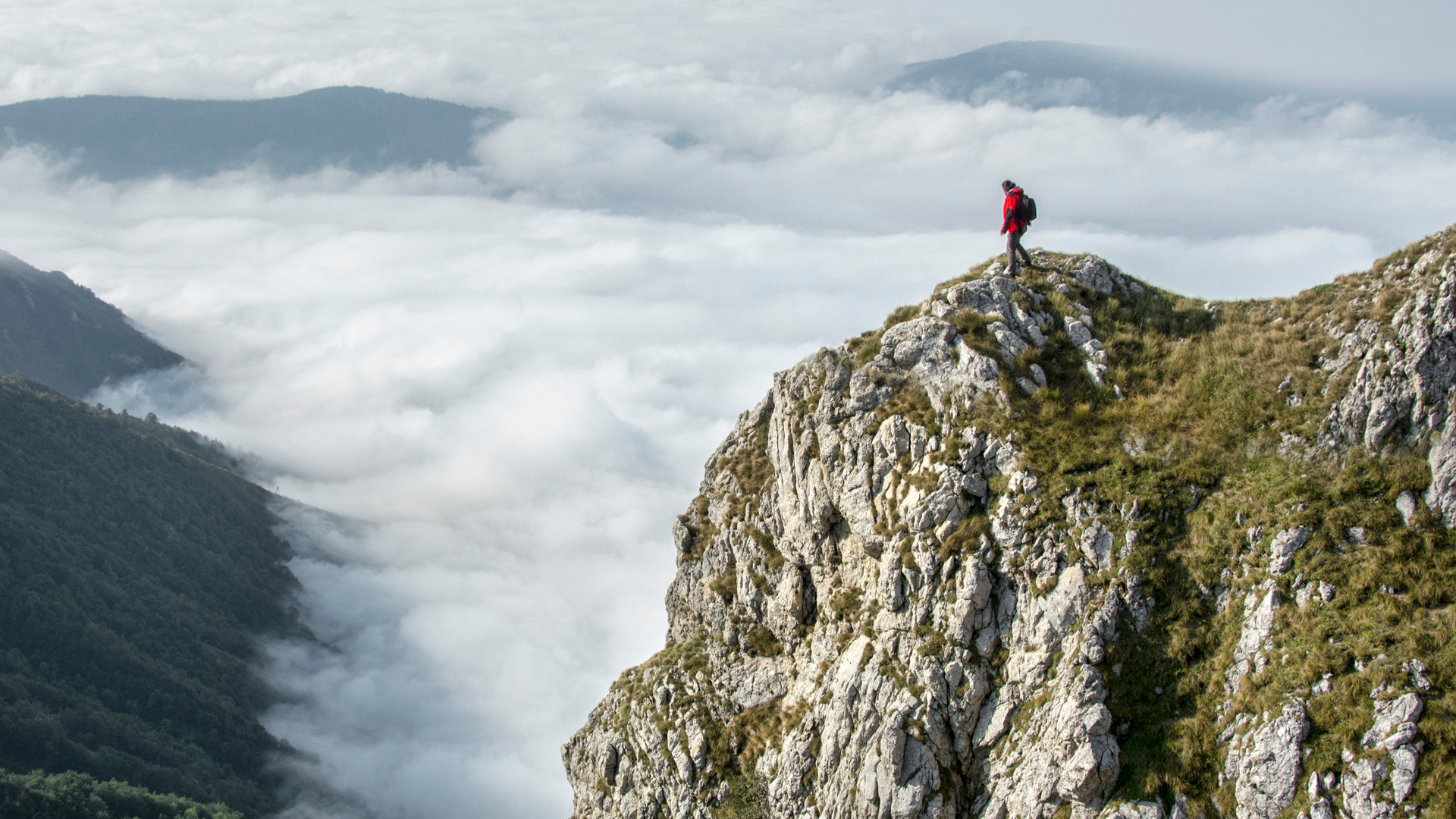 Person on top of a Mountain